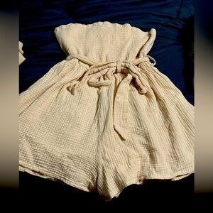 Strapless romper shorts/dress, more of a tan/beige color. Very comfortable